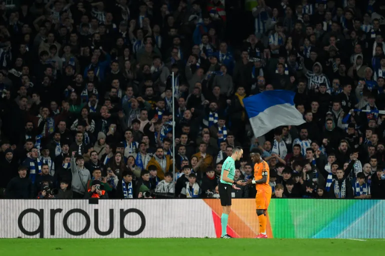 Vini Speaking to Referee for the Death Chant of Fans